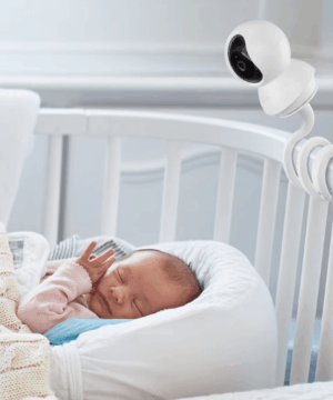Flexible baby monitor mount with adjustable arm attached to a crib for a perfect view of the baby.
