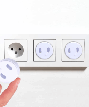 White ABS French-standard child safety socket cover, designed to protect toddlers from electrical shocks, fits securely into outlets to prevent tampering.