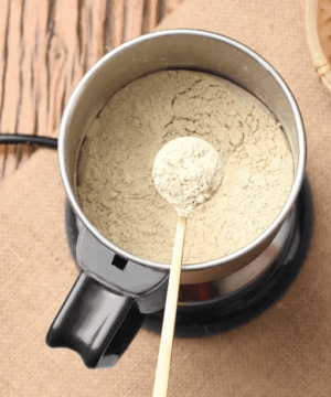 400W Electric Grinder with stainless steel housing and portable handle, ideal for grinding coffee, baby food, nuts, and spices with customizable grinding levels.